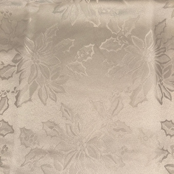 New in package. Ivory/cream 52”x70” oblong tablecloth. - Picture 2 of 5